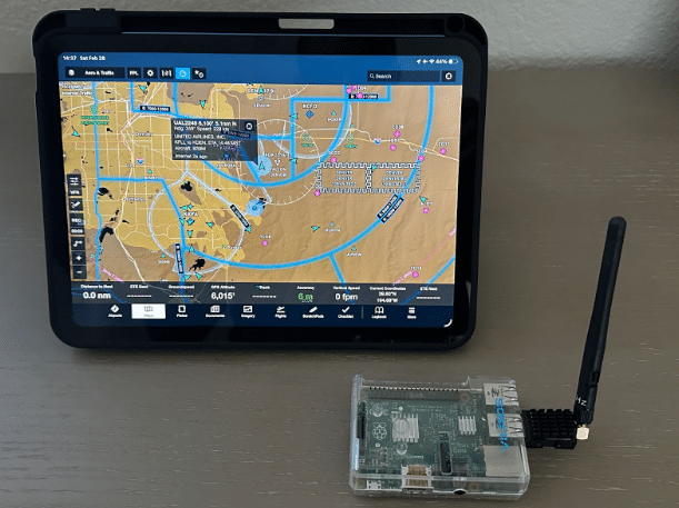 iPad running the ForeFlight aviation application displaying nearby aircraft data received from a Raspberry Pi based ADS-B receiver.